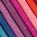colorful-background-stack-colorful-fabric_42299-580-1-300x169